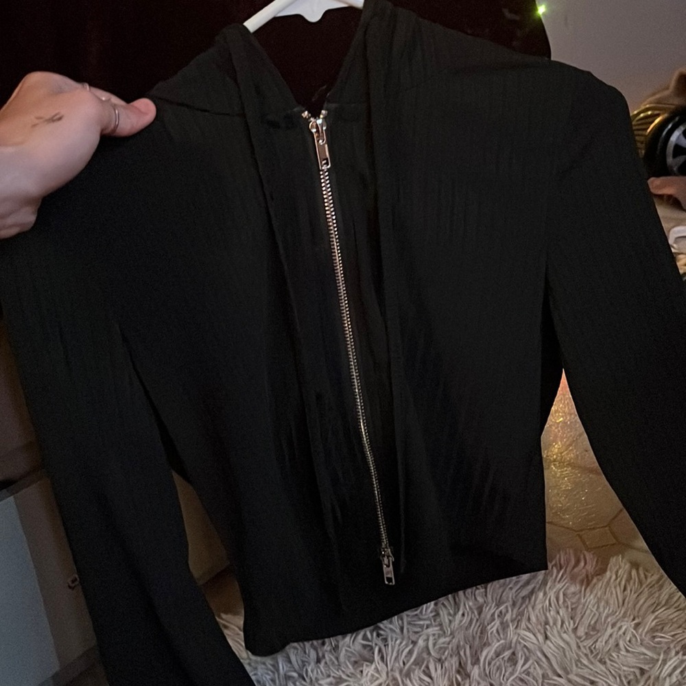 cropped jacket in size medium light weight and thin with hood strings